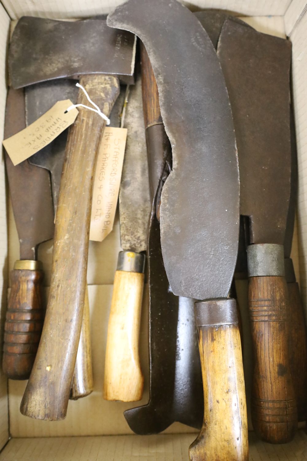 Mixed hand tools including a hatchet, together with the illustrated Encyclopedia of Woodworking Hand Tools and Devices by Graham Blackb